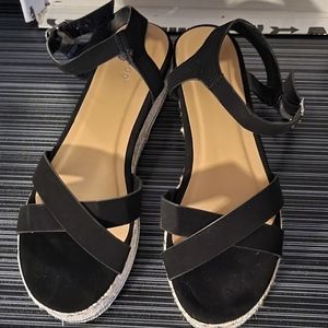 Black woman platforms, size 10